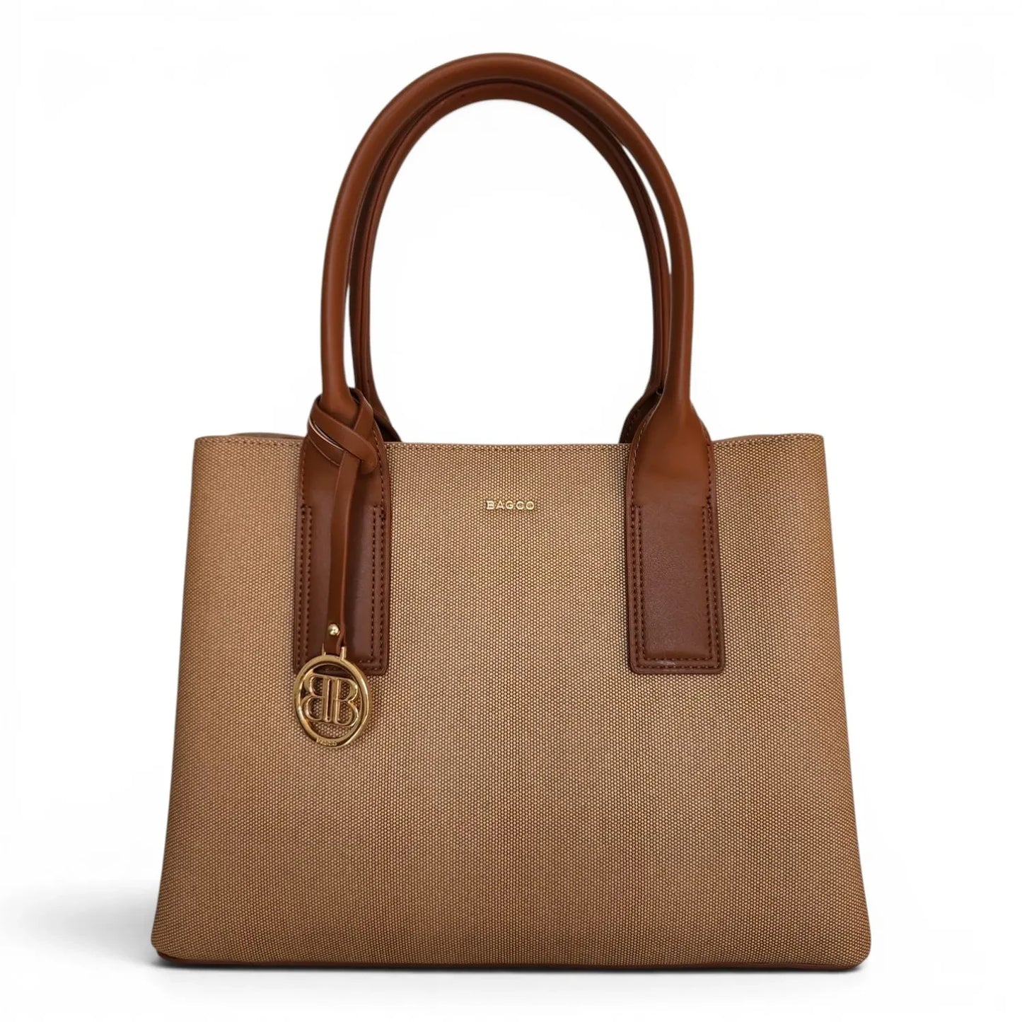 BRIKLYN BAGGO tan canvas tote bag with brown faux leather handles and gold-toned logo charm on a white background