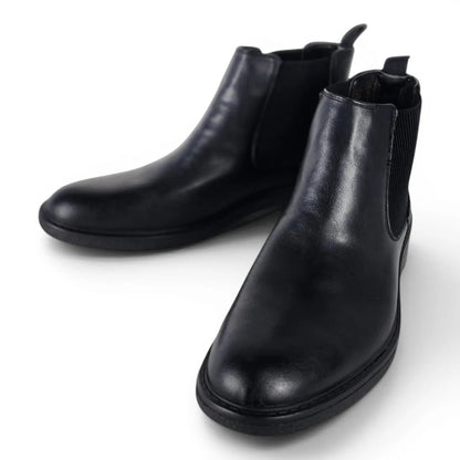 BRIKLYN classic black faux leather Chelsea boots with elasticated side panels and lug sole.