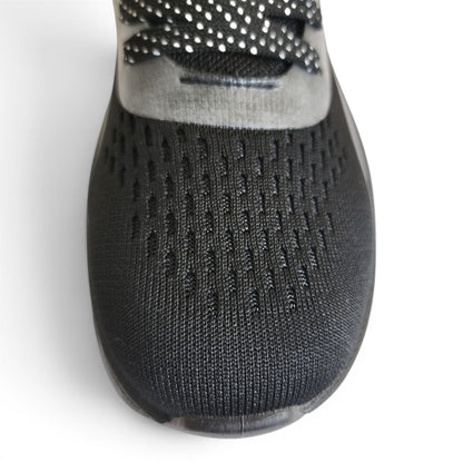 BRIKLYN performance running sneaker with a black breathable knit upper and patterned laces on a white background