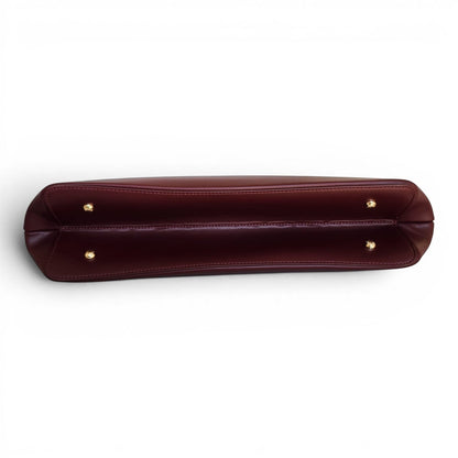 BRIKLYN CHRISBELLA burgundy synthetic leather tote bag base with four protective gold-tone metal feet