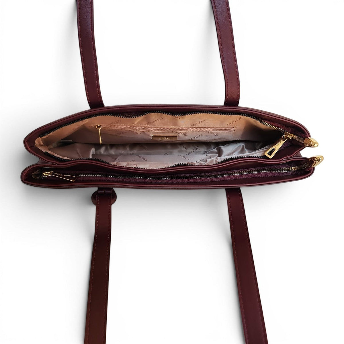 BRIKLYN CHRISBELLA burgundy synthetic leather tote bag interior with gold zippers and branded fabric lining