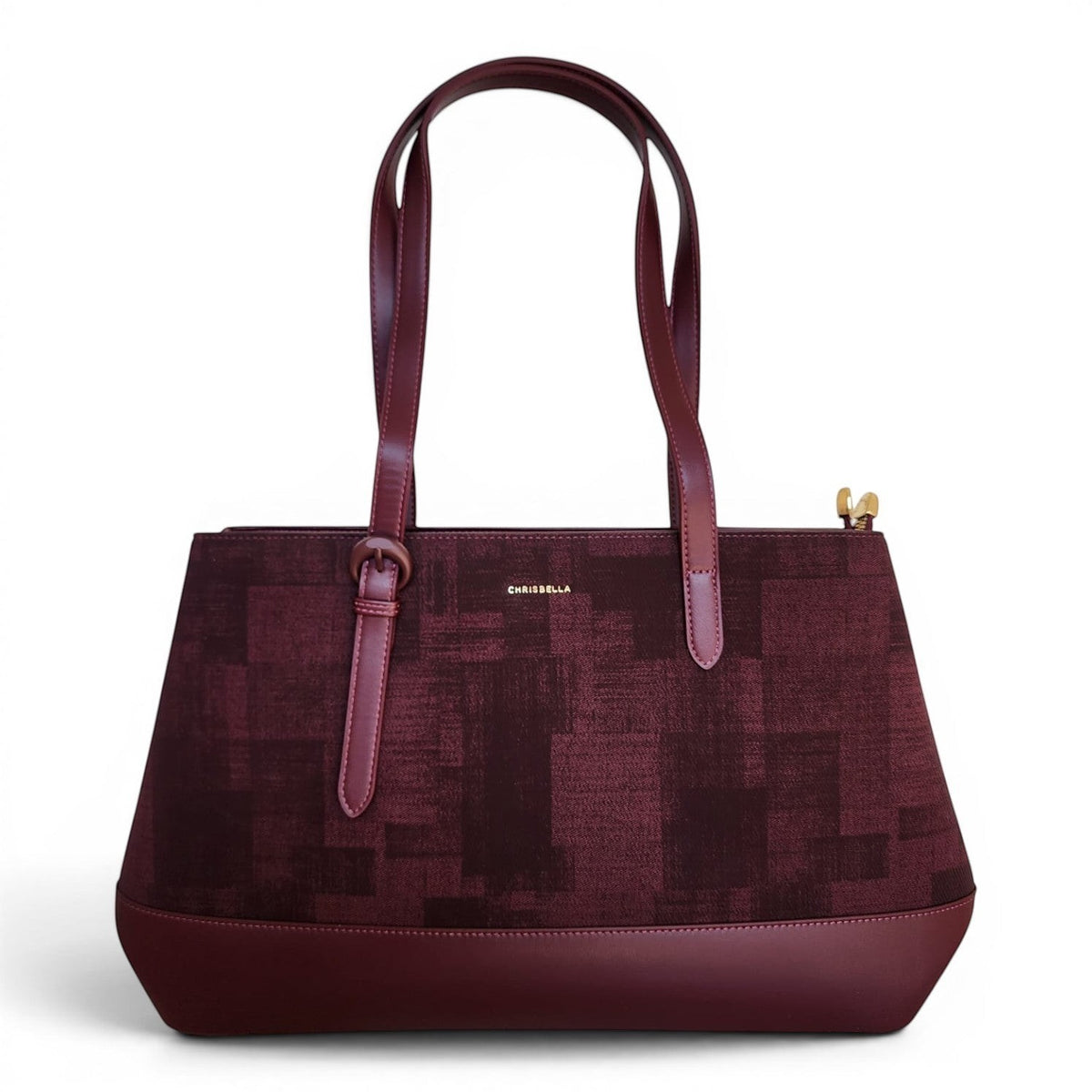 BRIKLYN CHRISBELLA burgundy structured tote handbag with a textured geometric pattern and smooth leather trim.