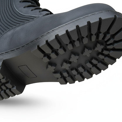BRIKLYN dark grey faux-suede combat boots with ribbed knit cuff and lug sole.
