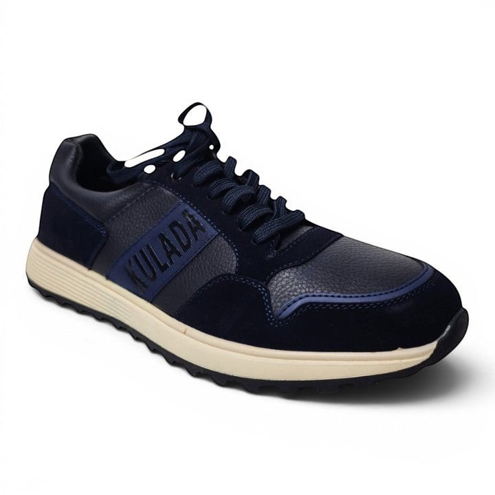 BRIKLYN men's navy blue suede and textured leather casual sneakers with cream sole and lace-up closure.