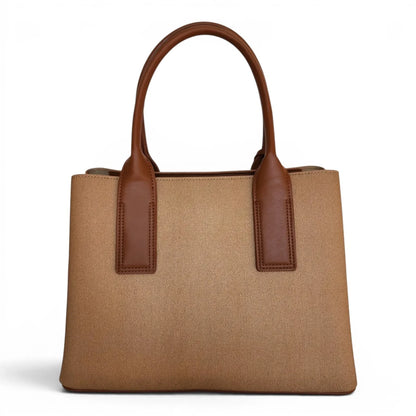 BRIKLYN tan canvas tote bag with brown faux leather handles and structured silhouette on a white background