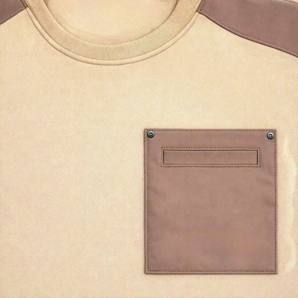 BRIKLYN tan crewneck sweatshirt with contrasting brown shoulder panels and a chest pocket. Cotton blend.
