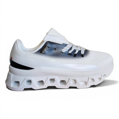 BRIKLYN white athletic running sneaker with a breathable knit upper and a sculpted geometric midsole.